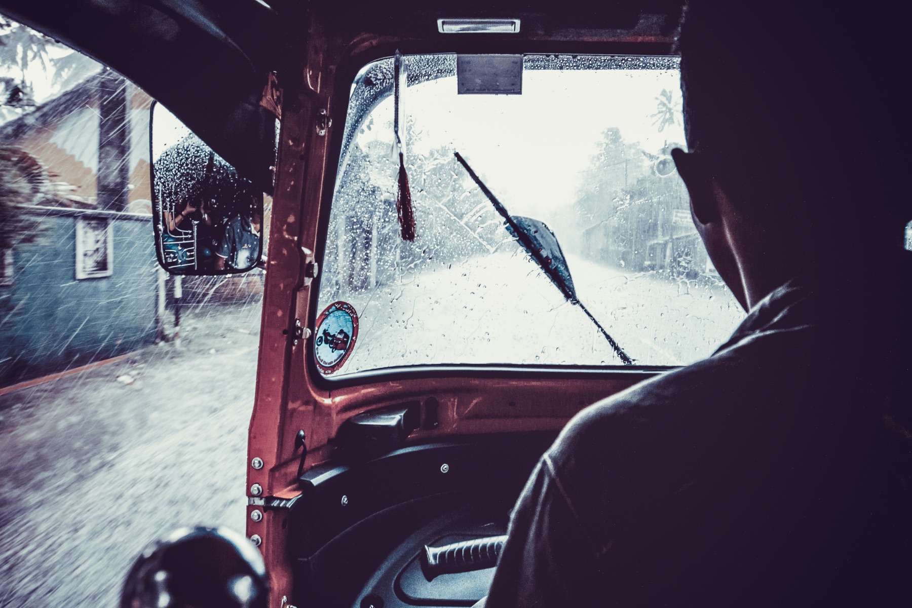 A rickshaw in the rain